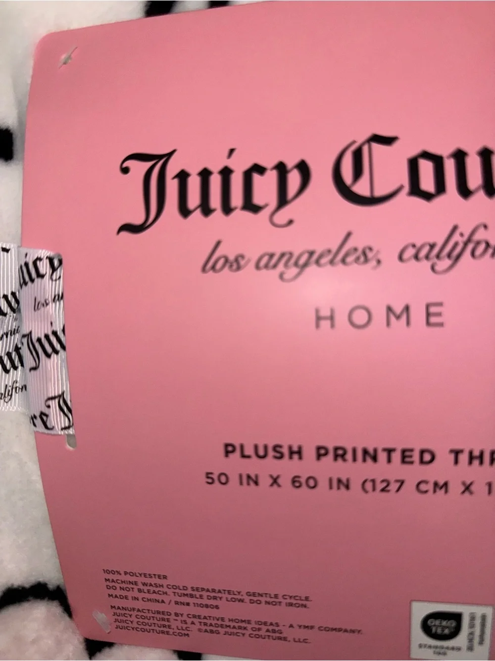 Juicy Couture White Fleece Throw with Black Heart & Bow Print light pink blanket